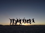 Cha-ching! Group leader Jose gets the money shot of both of our groups leaping into the sunset - Salar de Uyuni, Bolivia.
